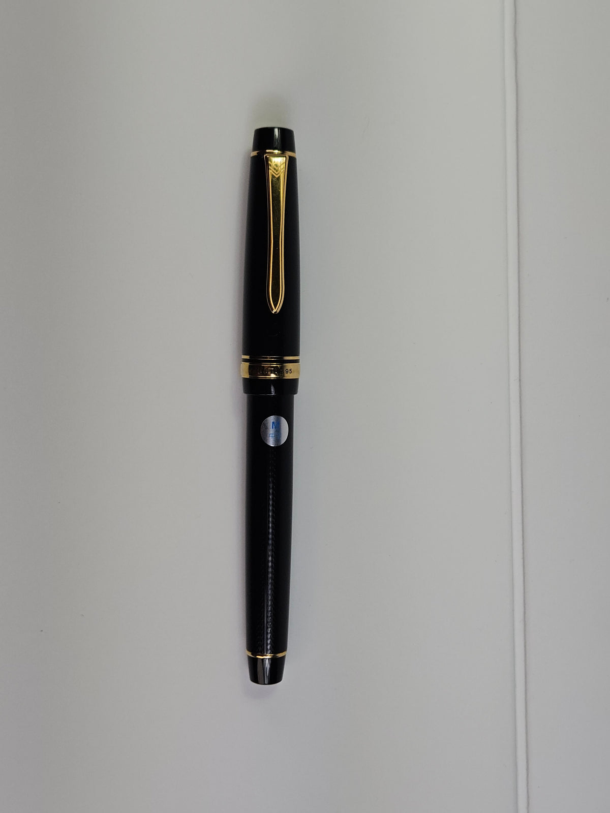 Pre-Owned Pilot Justus Fountain Pen - Black with Gold Trim - 14K Medium Nib (SAC)