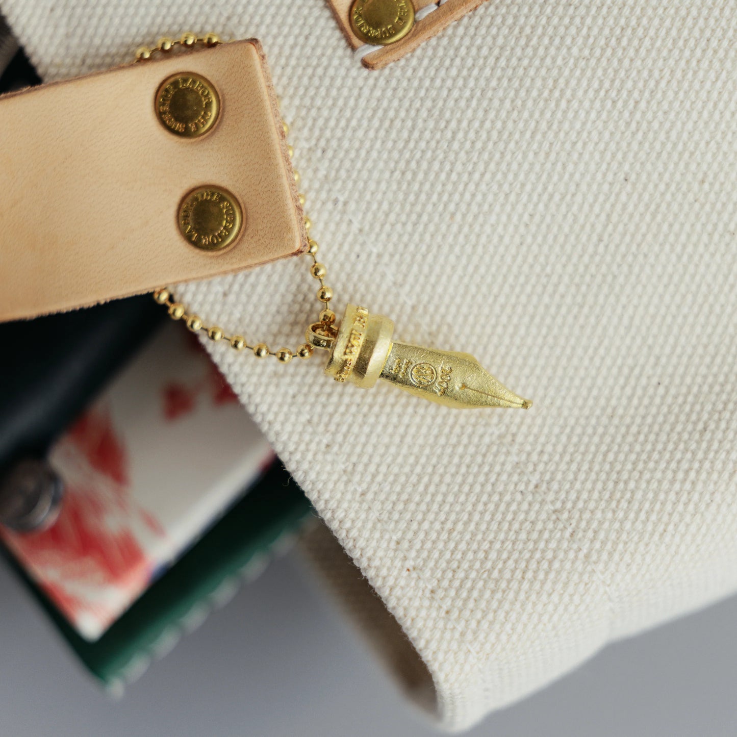 The Superior Labor Charm - Nib Charm